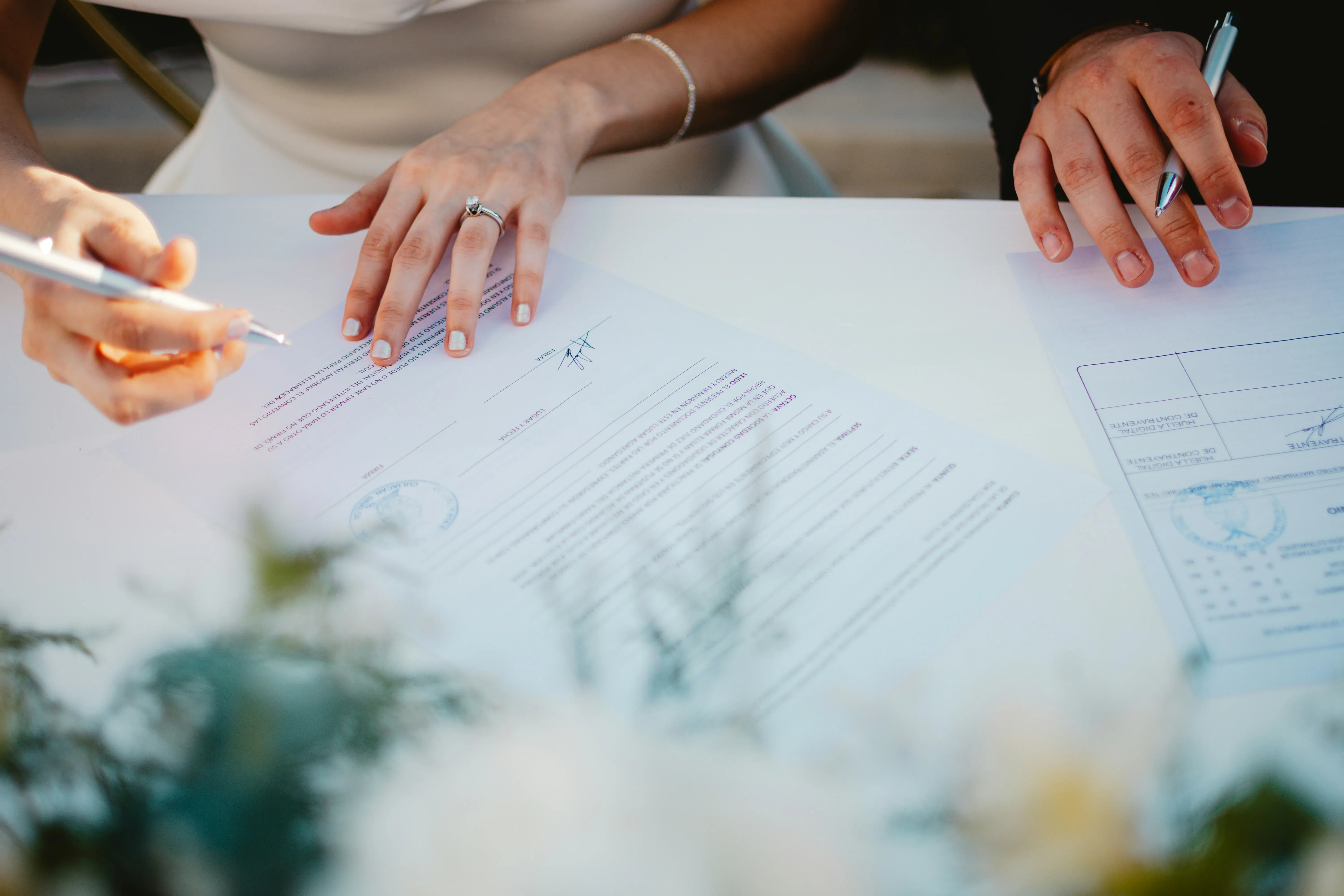 Hands writing documents